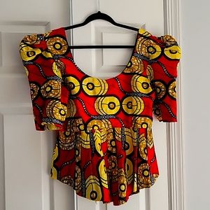 Authentic Womens African-Ankara top. Deep neckline and back line, red and yellow